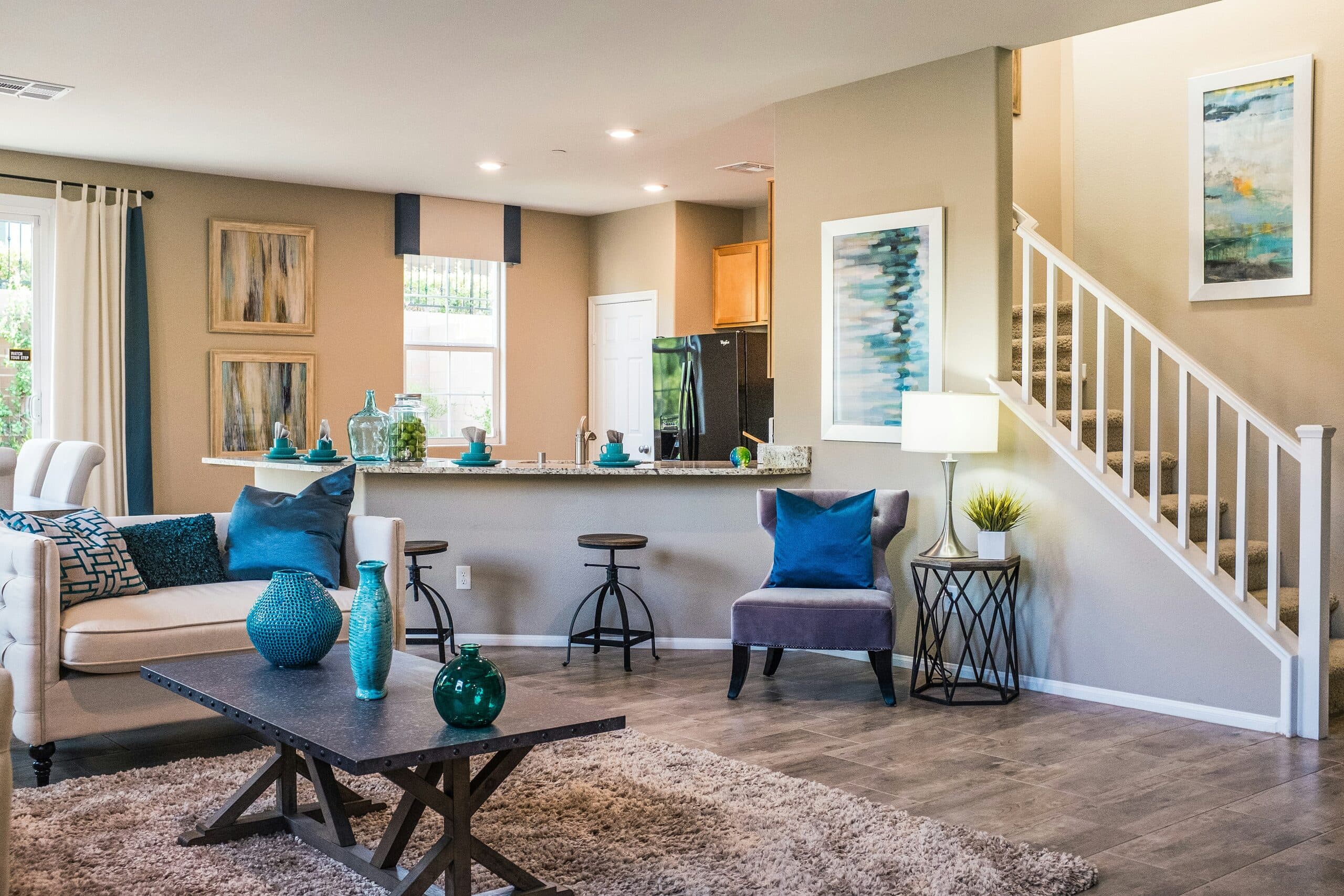 New second-story addition and chef's kitchen beneath a central skylight stair